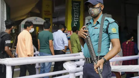 Getty Images police at hindu temple in dhaka