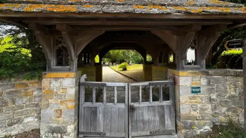Dominic King/BBC Entrance to St Peter's Church.