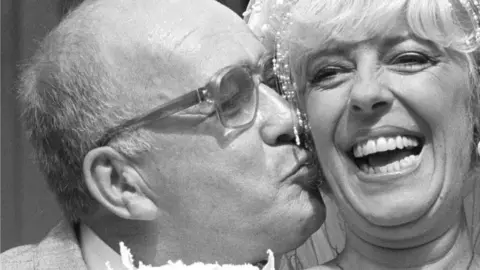 PA Alec Gilroy and Julie Goodyear