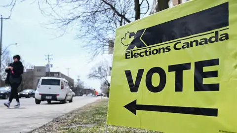 Signage outside a polling location in Montreal, Quebec, Canada, on 21 April, 2025