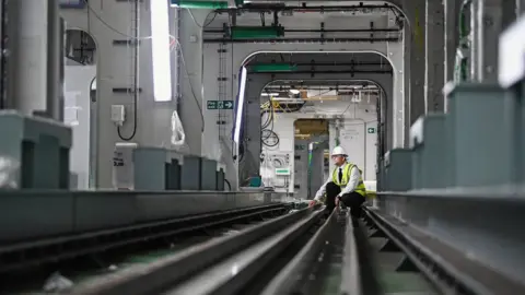 Getty Images Chief Petty Officer Russell Prydderch sits inside the weapons handling system