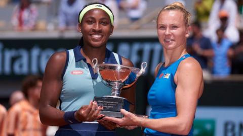 Coco Gauff and Katerina Siniakova with the French Open women's doubles title