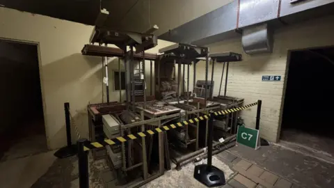 Interior shot of some of the stripped out communications kit at Dumpy Level in tunnels of Dover Castle