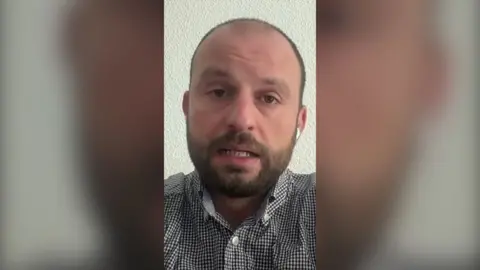 A close-up of Alessio Ghirlanda during remote interview