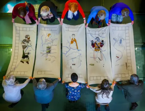 Phil Wilkinson A group of stitchers