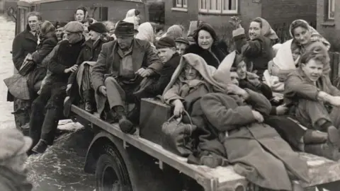 LRF Archive People being evacuated from their homes