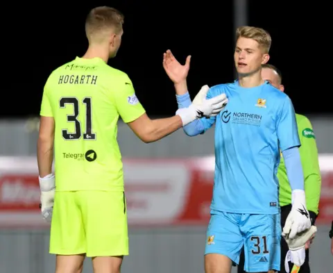 Falkirk FC Nicky and Jay Hogarth at the end of the match