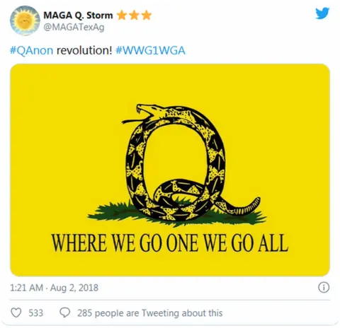 Twitter a tweet with a QAnon snake