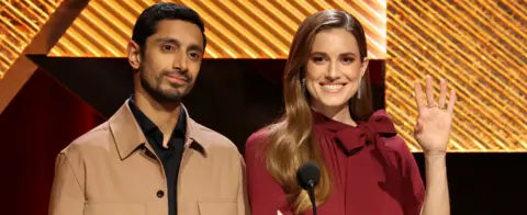 Reuters Actors Riz Ahmed and Allison Williams