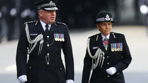 PA Sir Craig Mackey with current Met Police commissioner Cressida Dick, before the funeral of PC Palmer