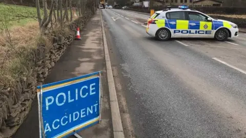 LDRS Police car on the A629 Penistone Road following an accident in 2021