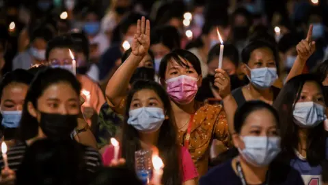 Reuters night time protest in Hledan junction Yangon 14 March