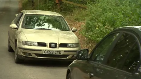 Cars nose-to-nose