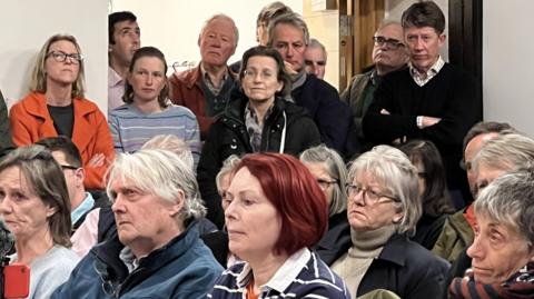 Local people packed into Malmesbury Town Hall
