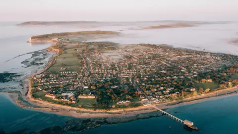 Getty Images An aerial view of Bembridge, Isle of Wight at sunrise 