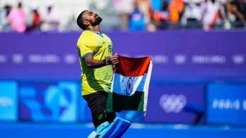 Getty Images PARIS, FRANCE - AUGUST 08: Sreejesh Parattu Raveendran of India gestures during Men's Bronze Medal Match of the Hockey between India and Spain on Yves-du-Manoir Stadium during the Paris 2024 Olympics Games on August 8, 2024 in Paris, France. (Photo By Oscar J Barroso/Europa Press via Getty Images)