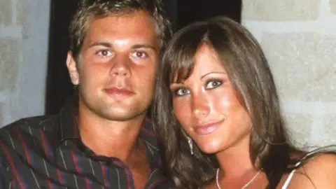 Marina Berry-Dealey Justin Dealey and Marina Berry-Dealey 20 years ago. Justin is on the left and has short light bown hair and is clean-shaven. He is wearing a brown shirt with thin white, red and blue stripes. Marina has shoulder-lengthy dark brown hair, cut in a fringe swept to her right on her forehead. She is wearing a white strappy top and a white necklace. Behind them is a wall.
