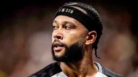 Memphis Depay looks on during a game for Corinthians