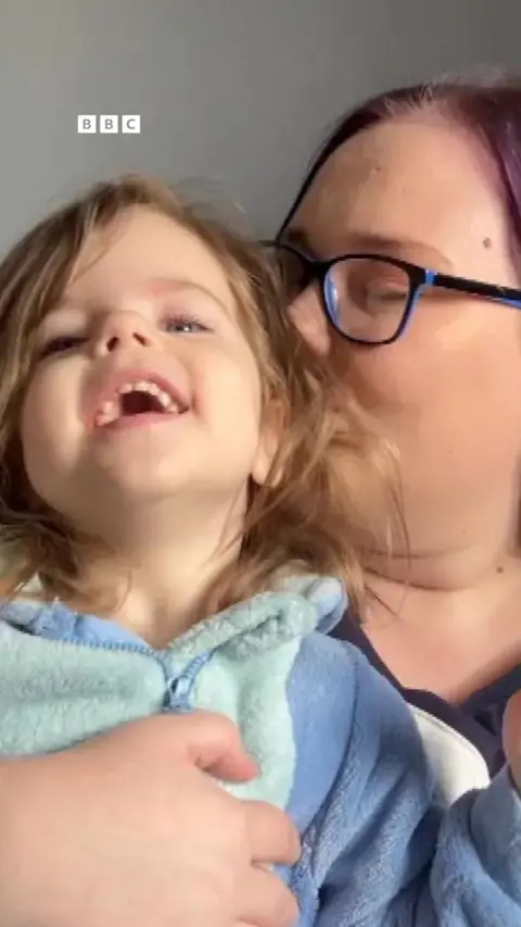 A woman and a child.