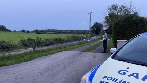 A cordon has been set up near the scene of the woman's death