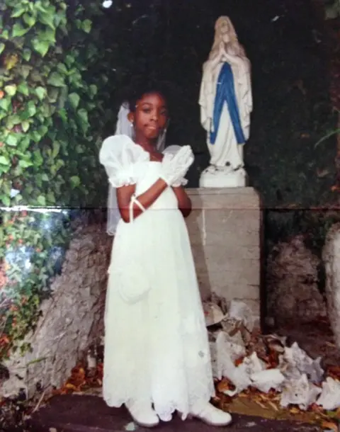 Nequela Whittaker Nequela Whittaker at her first communion