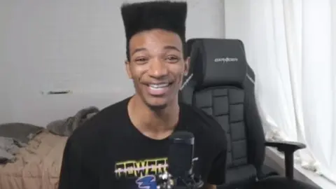 Etika/YouTube YouTuber Etika, also known as Desmond Amofah, in his home