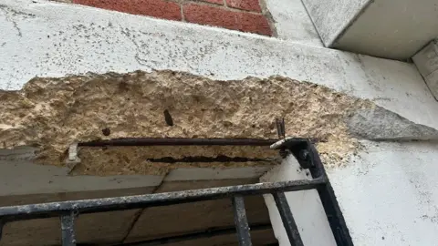 BBC A crumbling section of wall