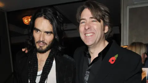 Getty Images Russell Brand (L) and Jonathan Ross attend the Music Industry Trusts' Awards at The Grosvenor House Hotel on November 2, 2009 in London, England