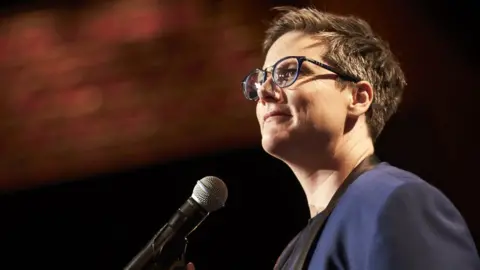 BEN KING/NETFLIX Hannah Gadsby in her Netflix comedy special Nanette