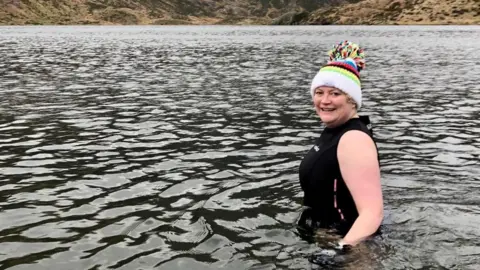 Sue Ryder Hospice Dawn open water swimming in Wales