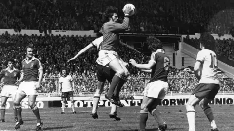 Evening Standard/Getty Images Paul Cooper in action for Ipswich Town in the FA Cup Final match against Arsenal at Wembley, which Ipswich won 1-0.