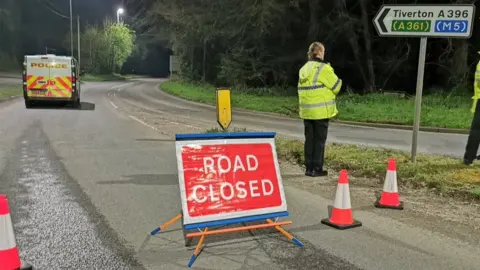 Lewis Clarke / Devon Live A396 with 'road closed' sign