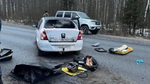 Ostorozhno Novosti via Reuters A view shows a car which, according to Russian authorities, the suspects in the shooting at Moscow's Crocus City Hall used to escape, on a road in Bryansk region