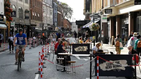 Reuters General view of a road that has been pedestrianised to encourage social distancing and outdoor dining in the city centre, amidst the coronavirus disease (COVID-19) pandemic, in Oxford, Britain