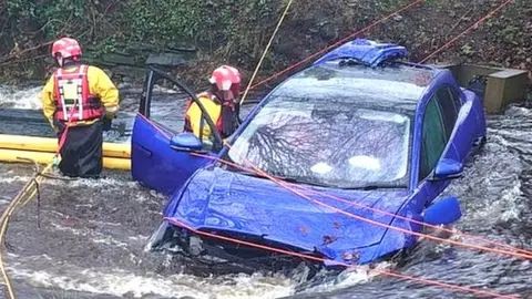 car in river