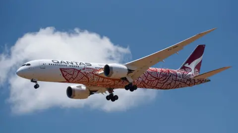 Getty Images A Qantas charter flight brings home Australians trapped overseas during the pandemic