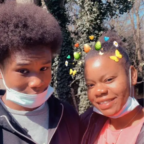 Family Dea-John Reid with a family member