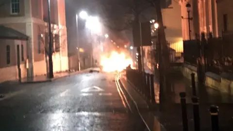 PSNI Car on fire in Londonderry