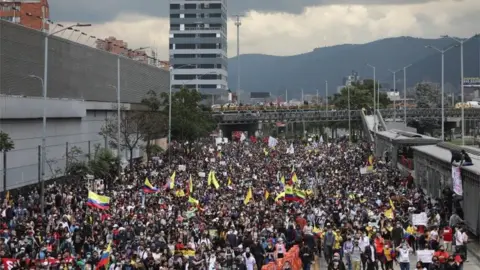 Reuters Demonstrators take part in a protest against the tax reform of President Ivan Duque"s government in Bogota, Colombia April 28, 2021