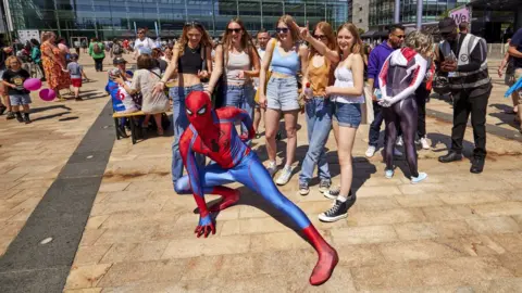 Mark Waugh Spiderman and women at We Invented The Weekend on Sunday