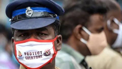 Getty Images A policeman wearing a mask in Chennai, Tamil Nadu state