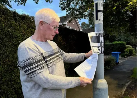 Kevin Shoesmith / BBC Steve Cutts pictured outside his home.