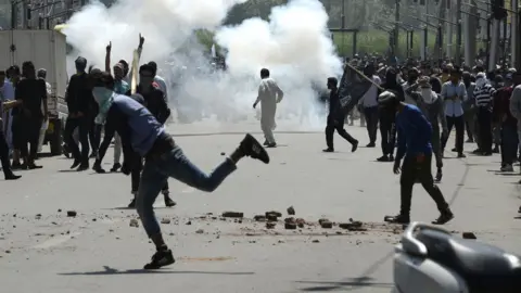 AFP Protesters clash with security forces at the funeral of Kaiser Bhat - 2 June