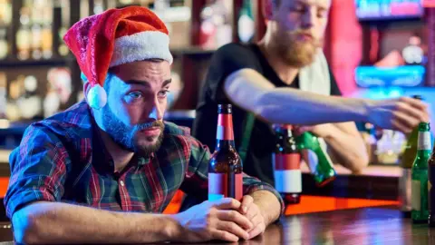 Getty Images Man at Christmas party
