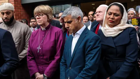 Getty Images Sadiq Khan and faith and community leaders gathered for the vigil at East London Mosque