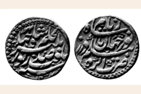 Silver A silver coin with the names of Nur Jehan and Jenhagir