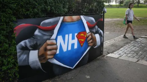 Getty Images A mural celebrating NHS workers by artist Lionel Stanhope at Hilly Fields, South London