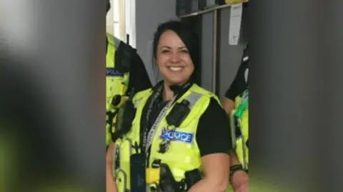 Bedfordshire Police PC Vetere smiling in her uniform.