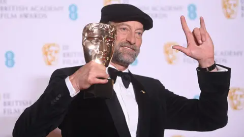 EPA Troy Kotsur at the Baftas