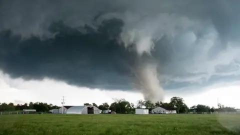 AFP/Getty Images A tornado rips through a residential area after touching down south of Wynnewood, Oklahoma on May 9, 2016